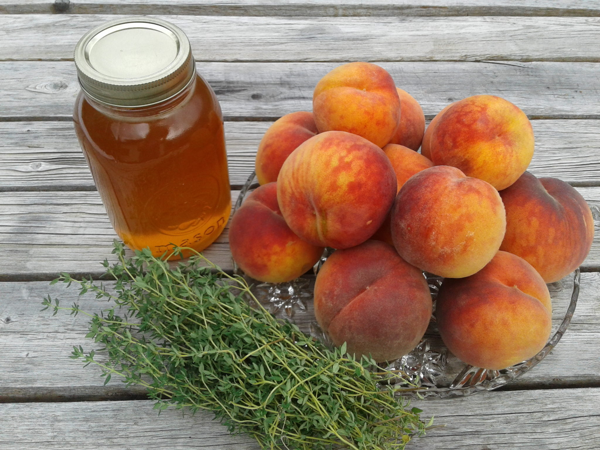 Broiled Glohaven Peaches with Thymed Honey